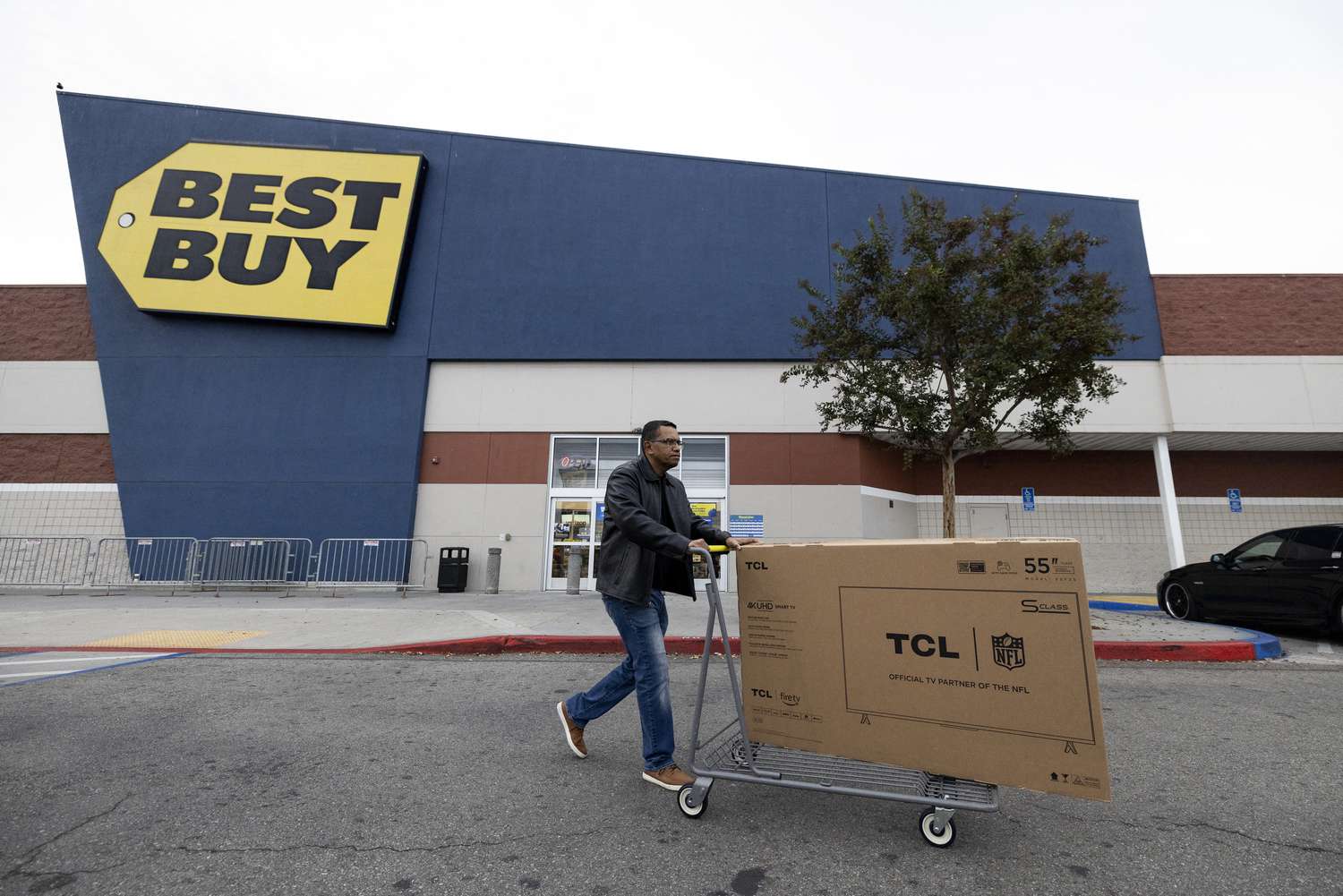 A shopper outside a California Best Buy store in November. 