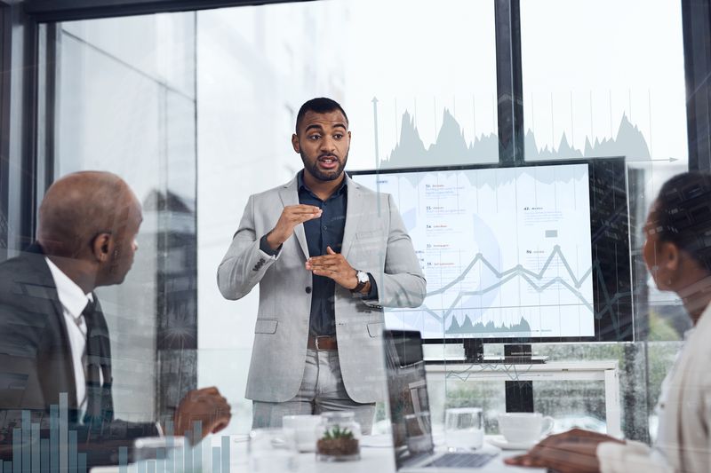 Man Presents Investment to Meeting