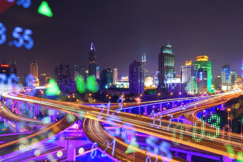 Display stock numbers and shanghai skyline background.