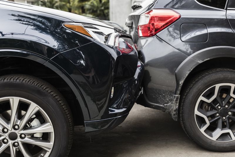 Damaged bumpers from car accident