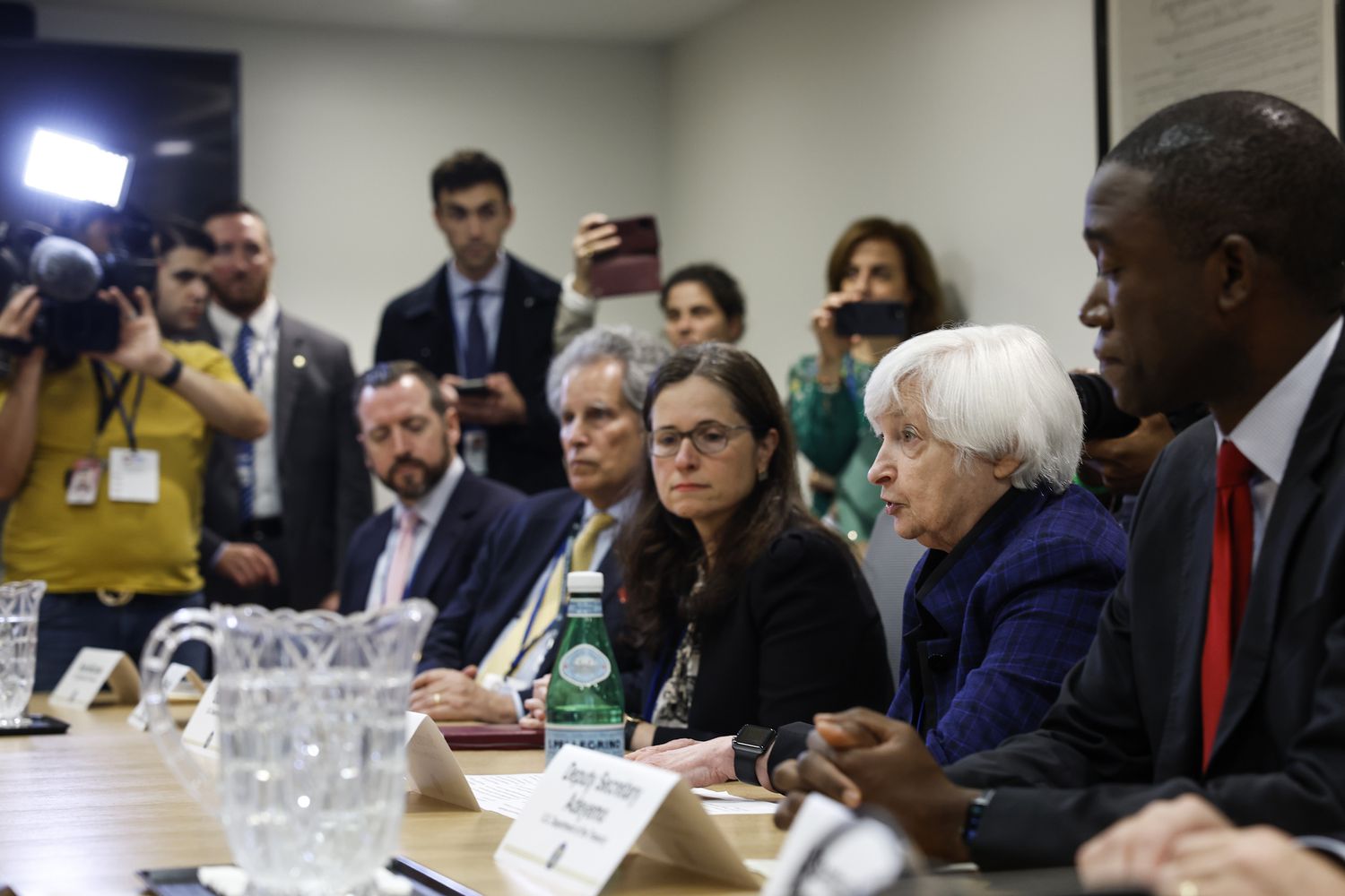  U.S. Treasury Secretary Janet Yellen (second from right) speaks during a meeting with European Commission Executive Vice-President and Trade Commissioner Valdis Dombrovskis and European Commissioner for Economy Paolo Gentiloni on the fourth day of the IMF and World Bank Annual Meetings at the International Monetary Fund (IMF) headquarters on October 13, 2022 in Washington, DC.
