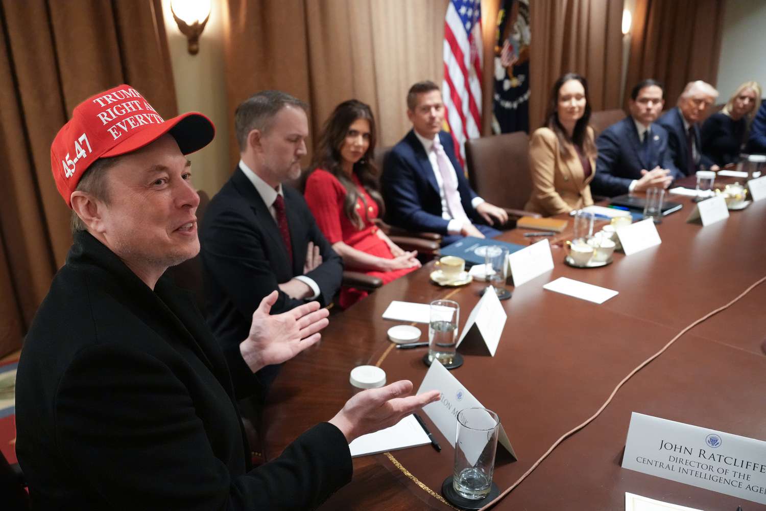 White House Senior Advisor, Tesla and SpaceX CEO Elon Musk (L) speaks during a cabinet meeting held by U.S. President Donald Trump at the White House on March 24, 2025 in Washington, DC. 