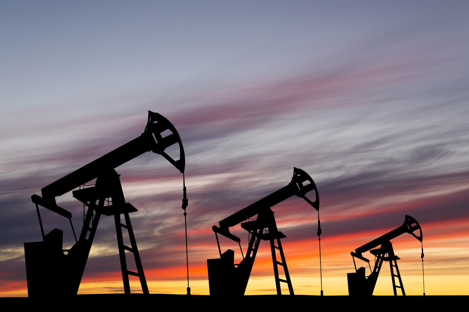 Oil Pumps amid Sunset