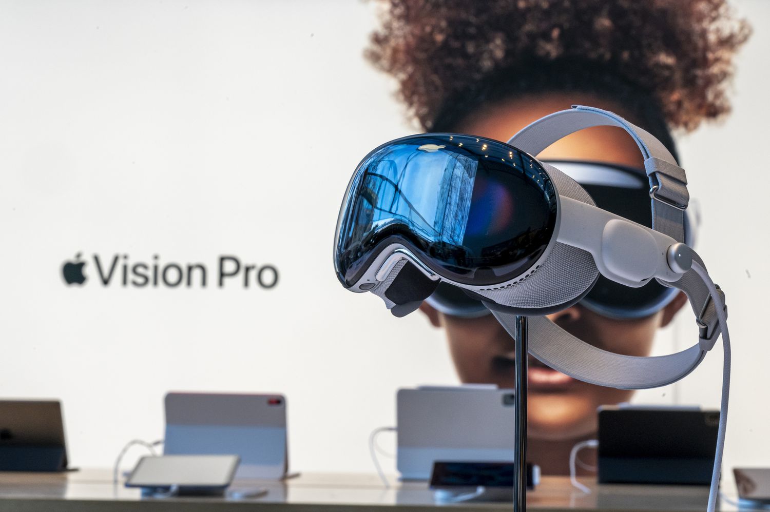 An Apple Vision Pro headset on display at a store.