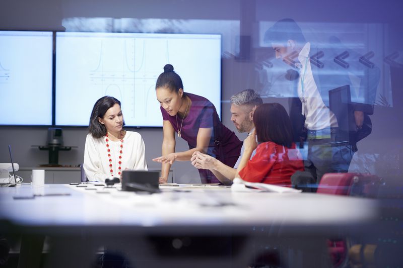 Group of people having business meeting.