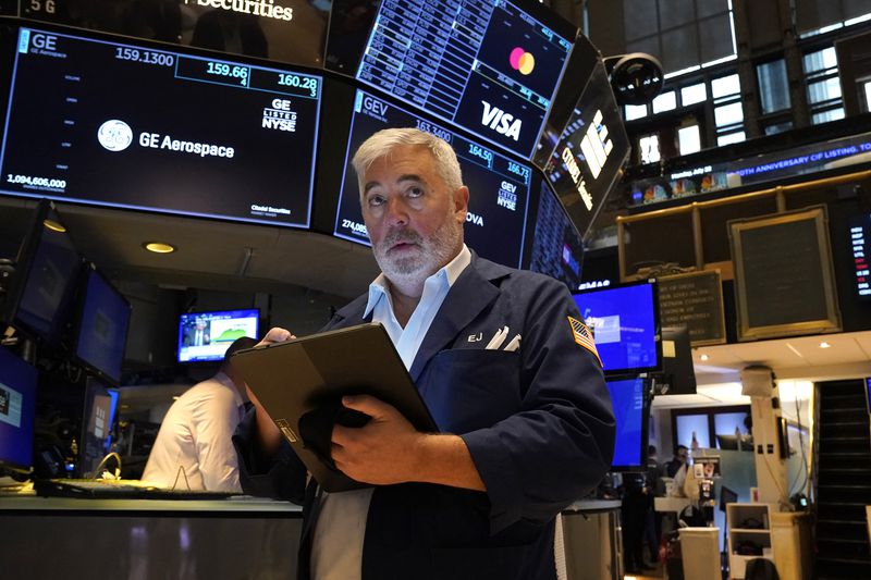 A trader on the floor of the New York Stock Exchange on Monday. 