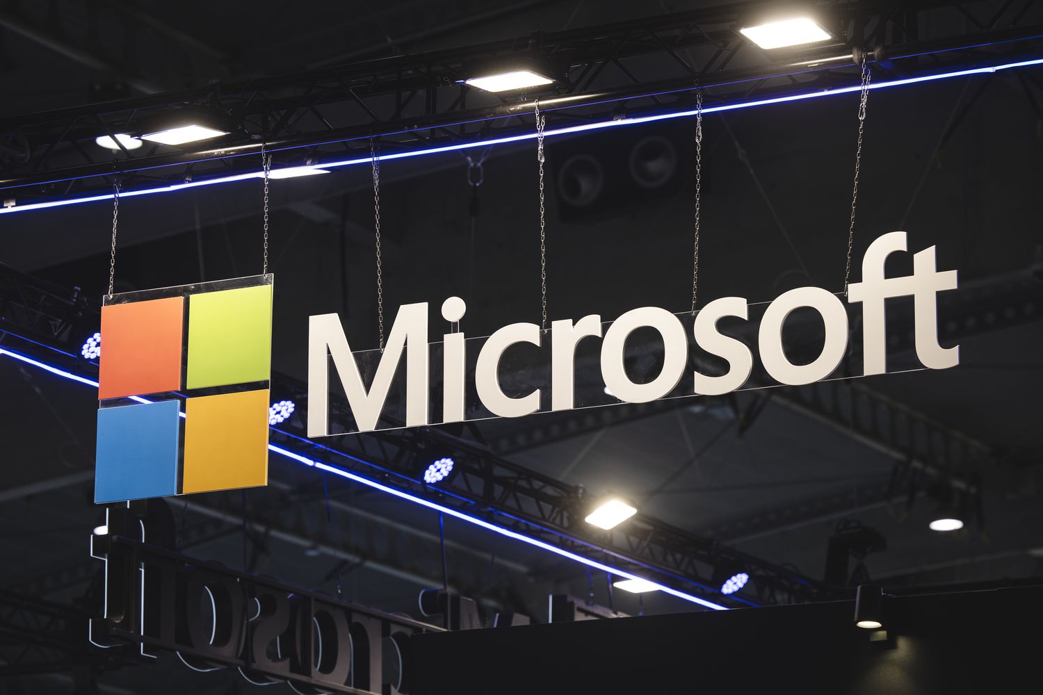 A sign with the Microsoft logo hangs at an event.