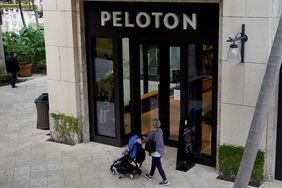 A person walks past a Peloton store on January 20, 2022 in Coral Gables, Florida.