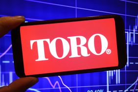The Toro Company logo is seen displayed on a smartphone screen