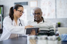 A senior patient visits a doctor.