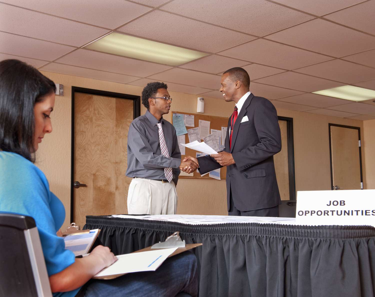 Employer interviewing prospective job applicant