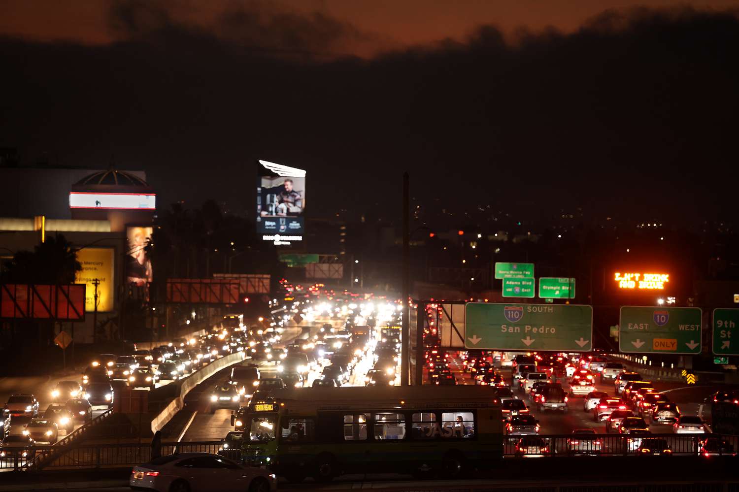 Los Angeles, California November 27, 2024-Holiday traffic clogs the 110 Freeway as commuters leave before the Thanksgiving weekend in Downtown Los Angeles. 