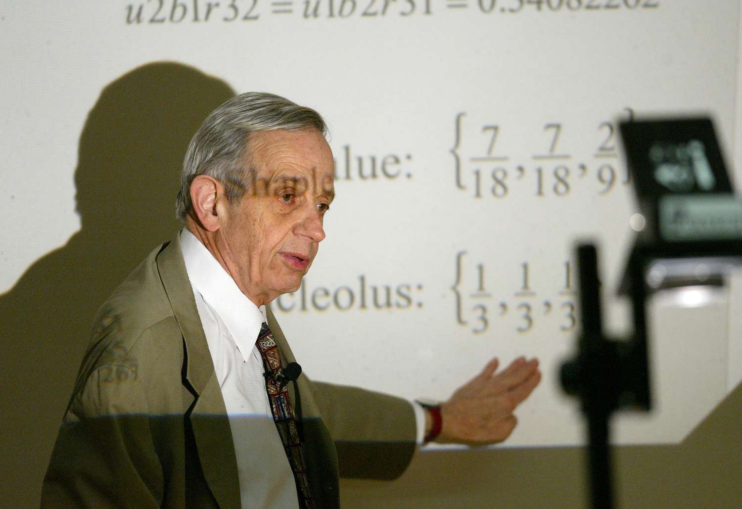 Nobel prize-winning mathematics genius John Nash of Princeton University works through his notes on game theory at the University of Hong Kong. 18 February 2003 