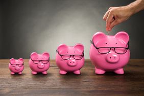 Four piggy banks, each larger than the last