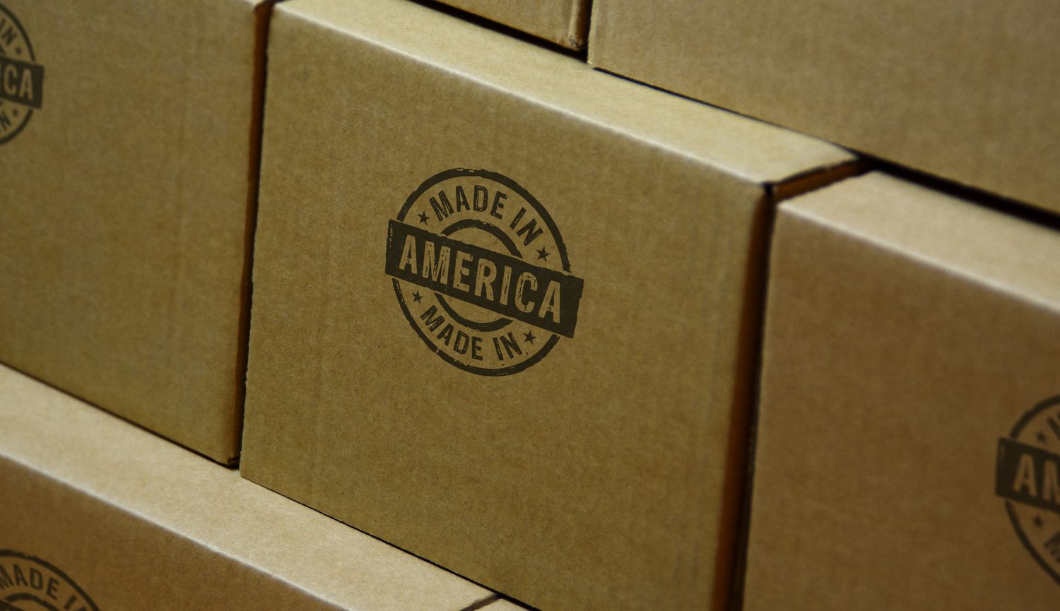 Stack of cardboard boxes stamped "Made in America"