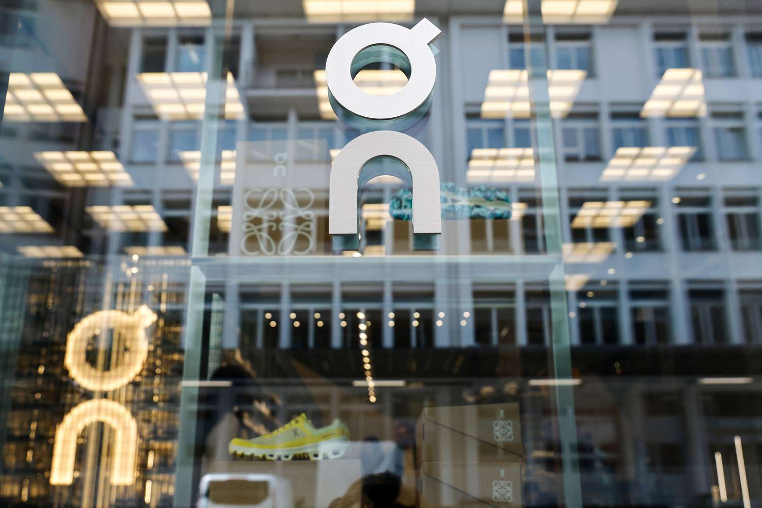 A logo in the window of the On Labs flagship store, operated by On Holdings AG, in Zurich, Switzerland