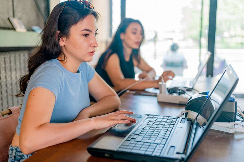 Women looking at computer
