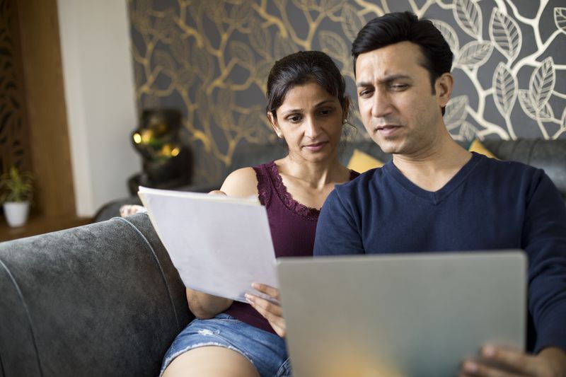 Couple figuring out how to pay bills after losing their jobs