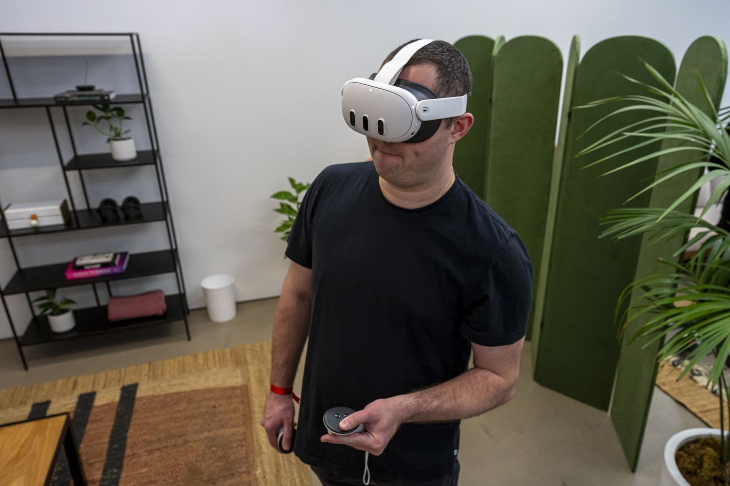 An attendee uses a Meta Platforms Inc. Quest 3 virtual reality (VR) headset during an event in San Francisco, California, US, on Sept. 18, 2023.
