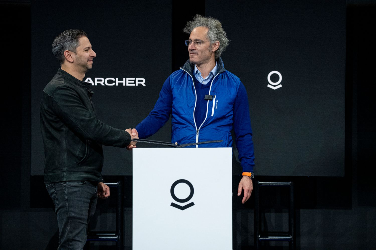 Adam Goldstein, founder and chief executive officer of Archer Aviation, left, and Alex Karp, chief executive officer of Palantir Technologies, during the AIPCon conference in Palo Alto, California, on March 13, 2025