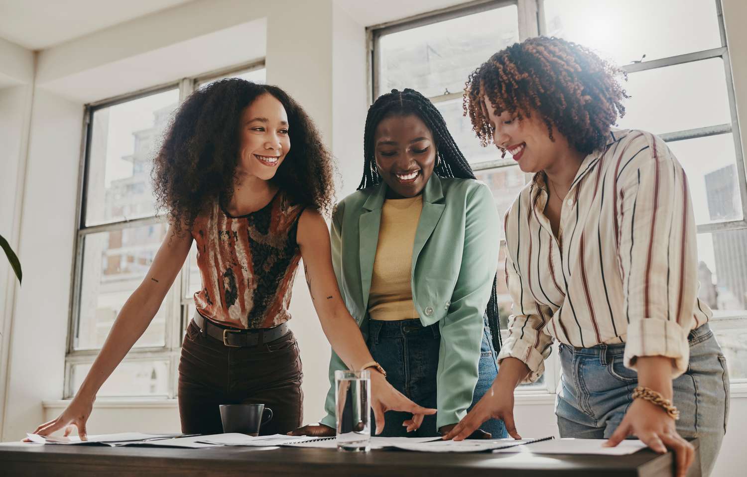 Three business women collaborating