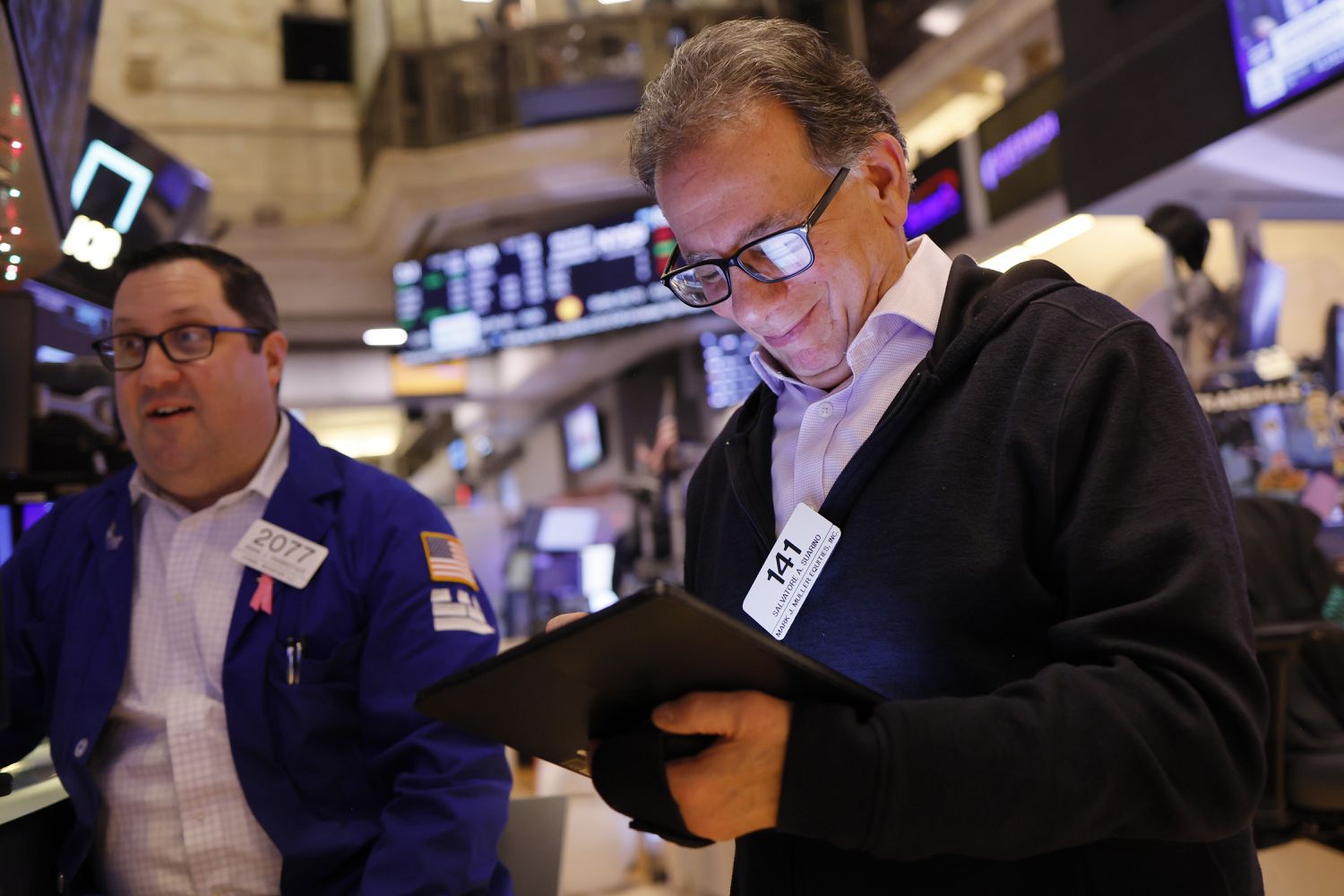 Traders work on the floor of the New York Stock Exchange.