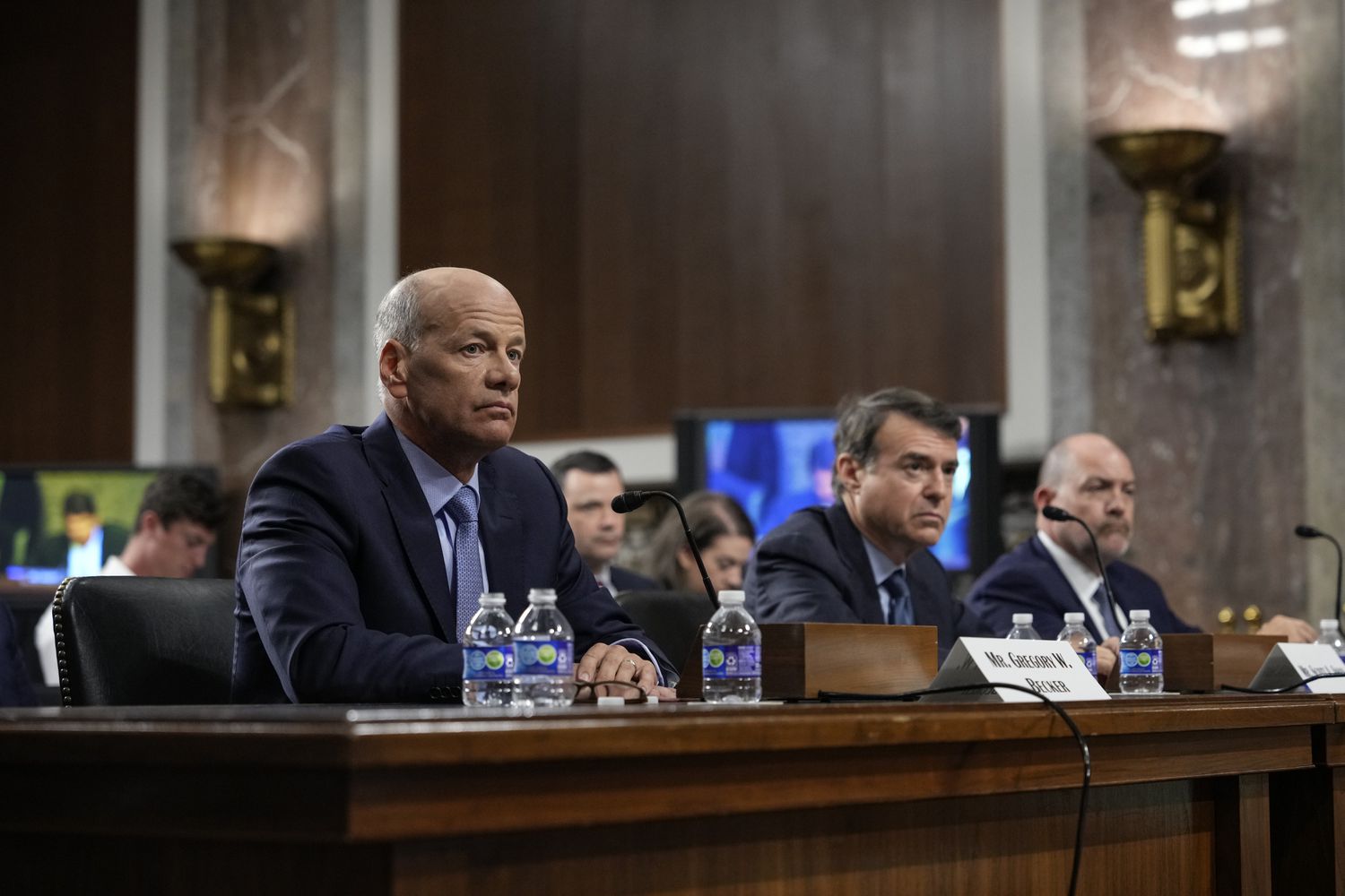 Former CEO of Silicon Valley Bank Gregory Becker, former chairman of Signature Bank Scott Shay and former president of Signature Bank Eric Howell testify during a Senate Banking Committee hearing on Capitol Hill May 16, 2023 in Washington, DC. The hearing was held to examine the recent failures of Silicon Valley Bank and Signature Bank. 