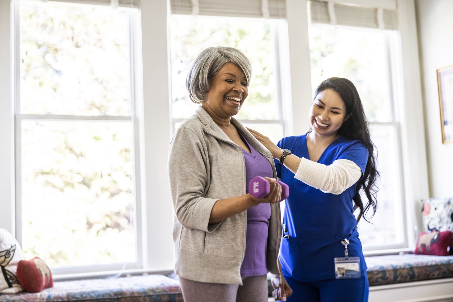 Senior woman and at home nurse
