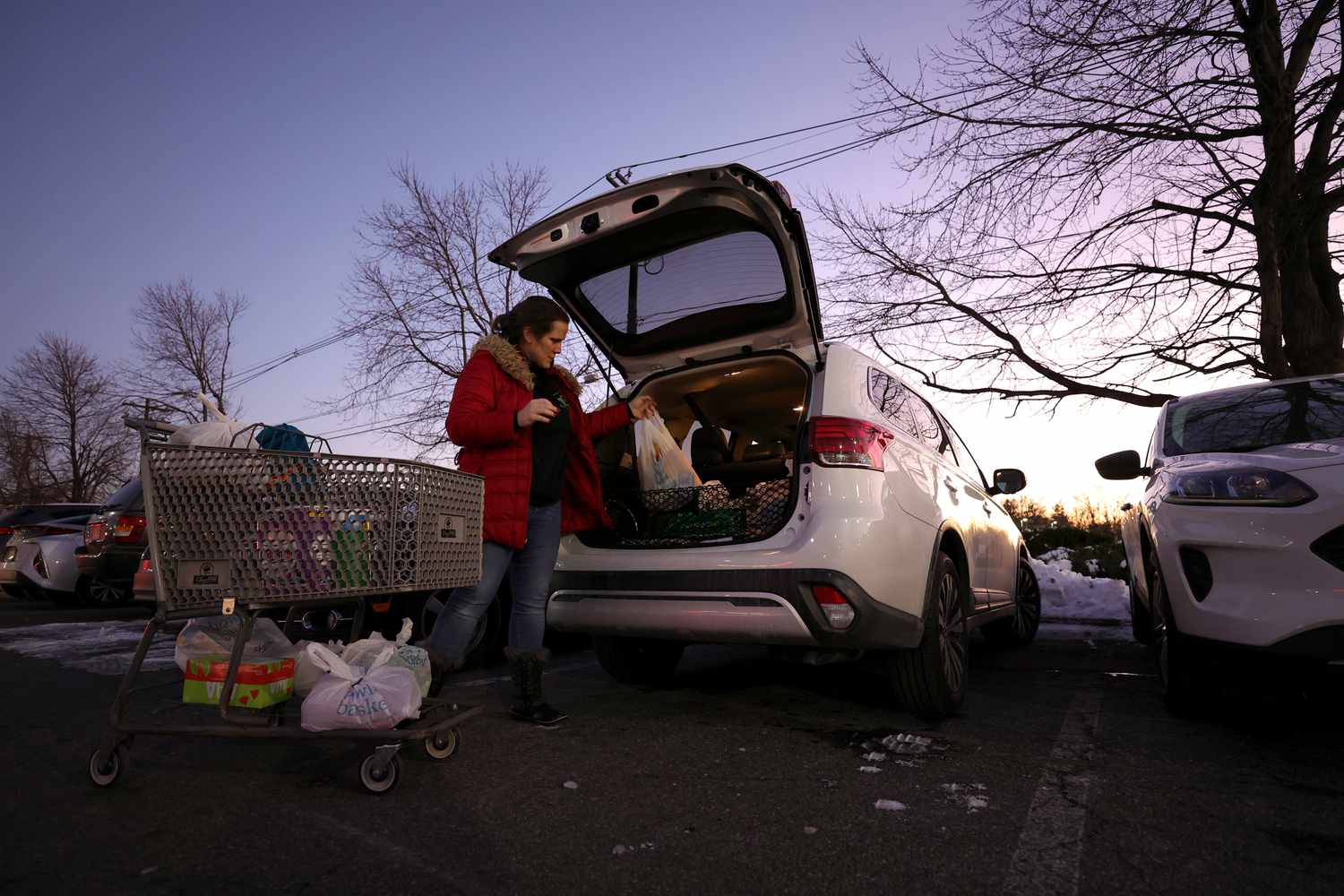 Clark resident Jen Valencia still works part time for Instacart, packing her SUV after completing two orders at ShopRite on January 08, 2022 in Clark, New Jersey.