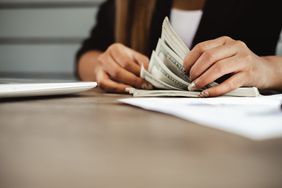 Woman counting money 