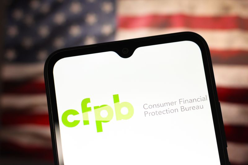In this photo illustration, the Consumer Financial Protection Bureau (CFPB) logo is seen displayed on a smartphone screen.