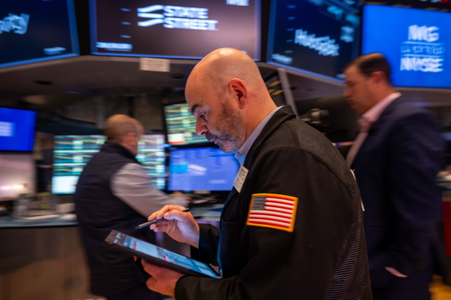 Traders work on the floor of the New York Stock Exchange on Wednesday.