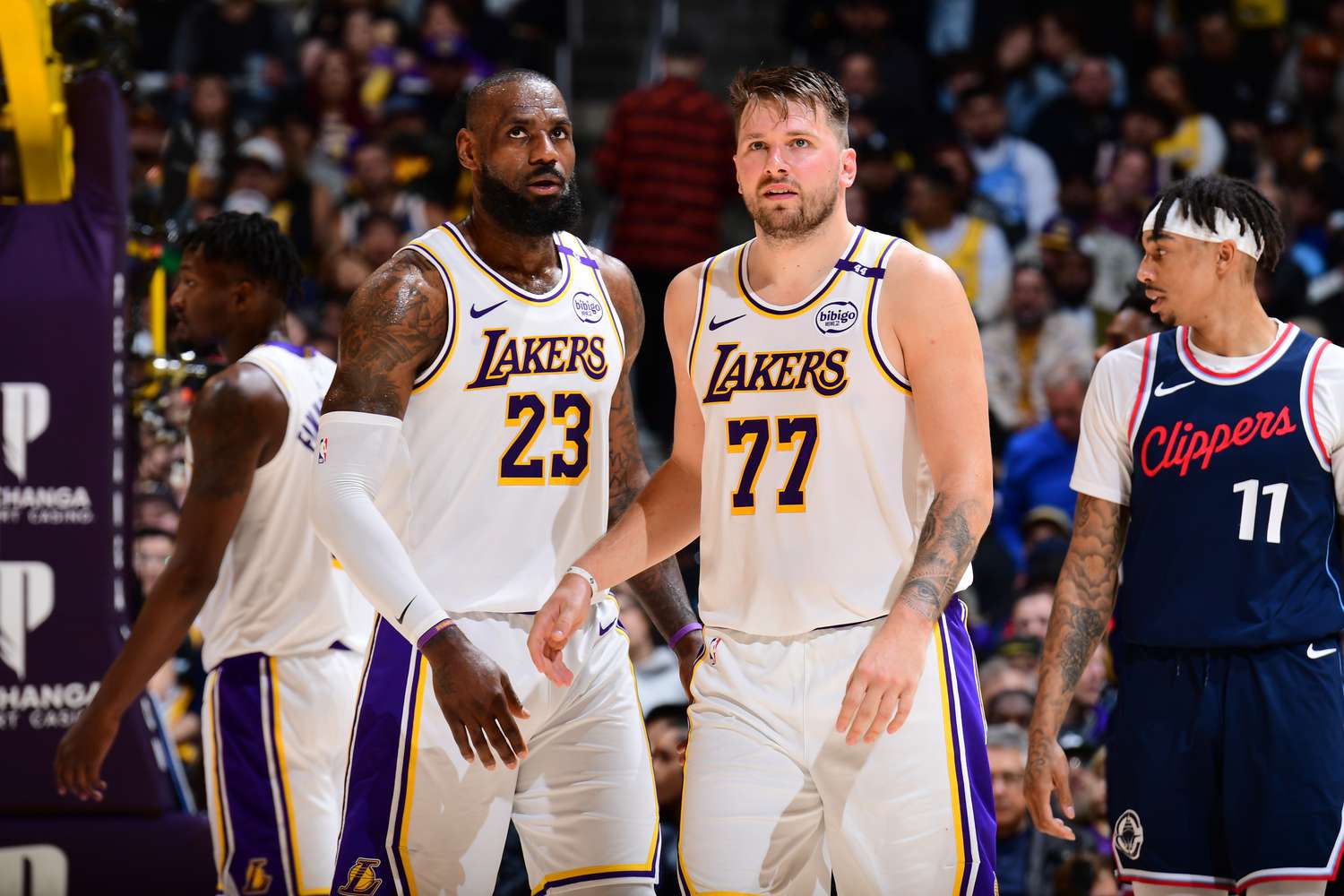 The Lakers' LeBron James, left, and Luka Doncic at a game earlier this month. 