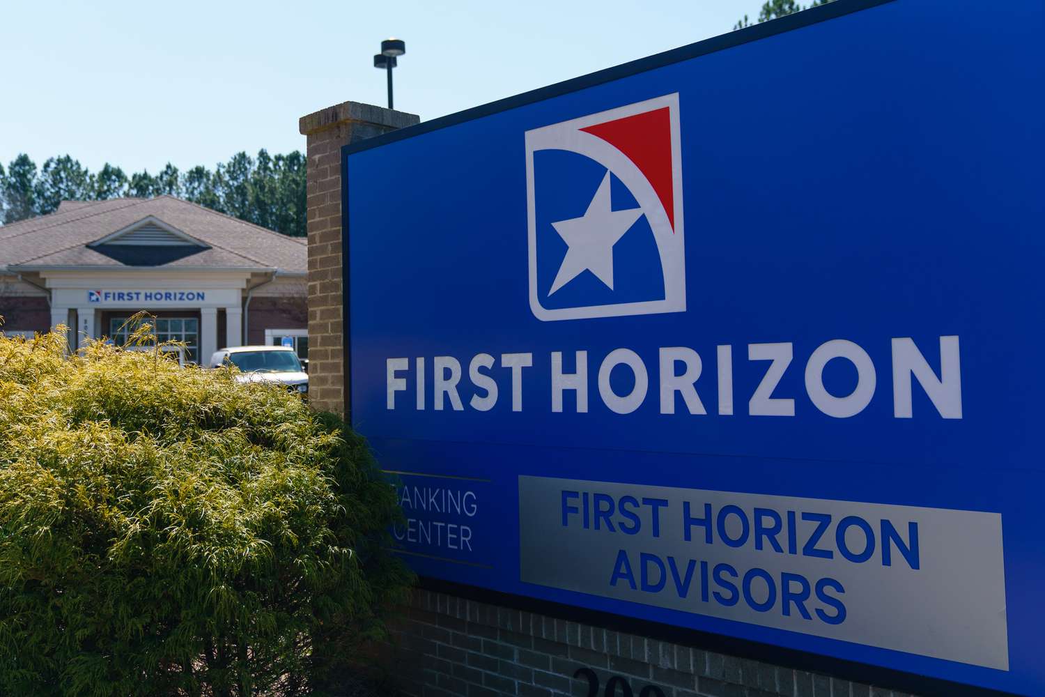 A sign outside a First Horizon bank branch 