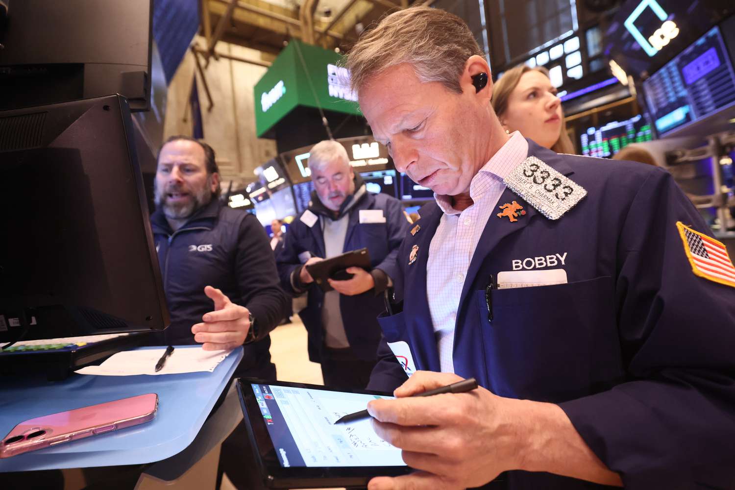 Traders work on the floor of the New York Stock Exchange 