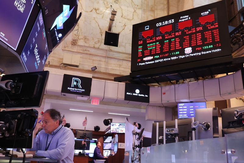 Traders work on the floor of the New York Stock Exchange.