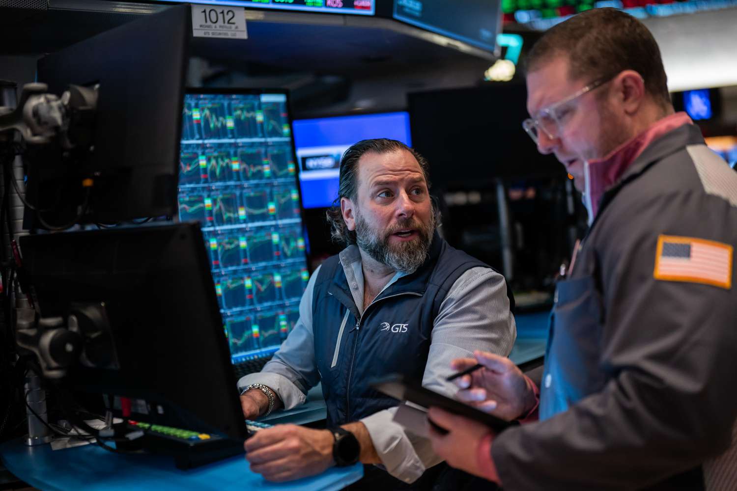 Traders work on the floor of the New York Stock Exchange during morning trading on April 15, 2025 in New York City.