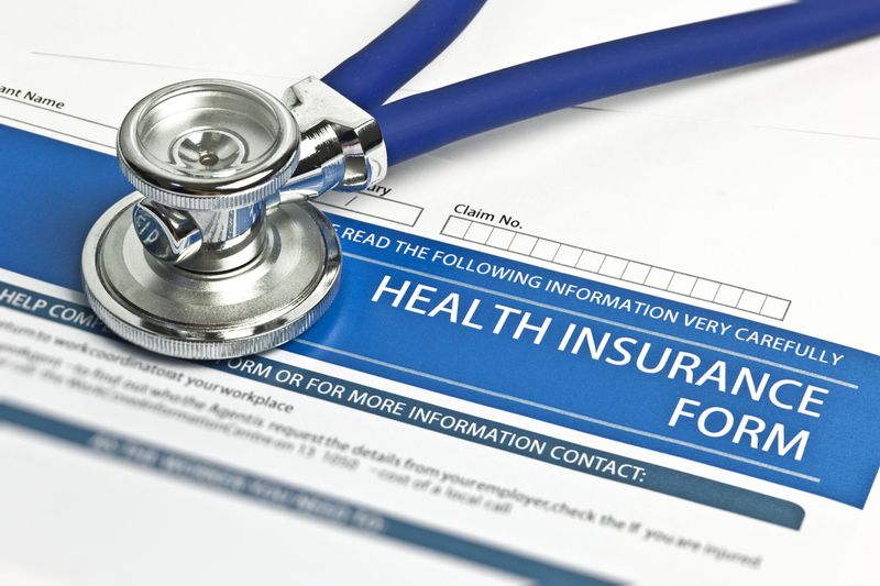 Health insurance form with a stethoscope