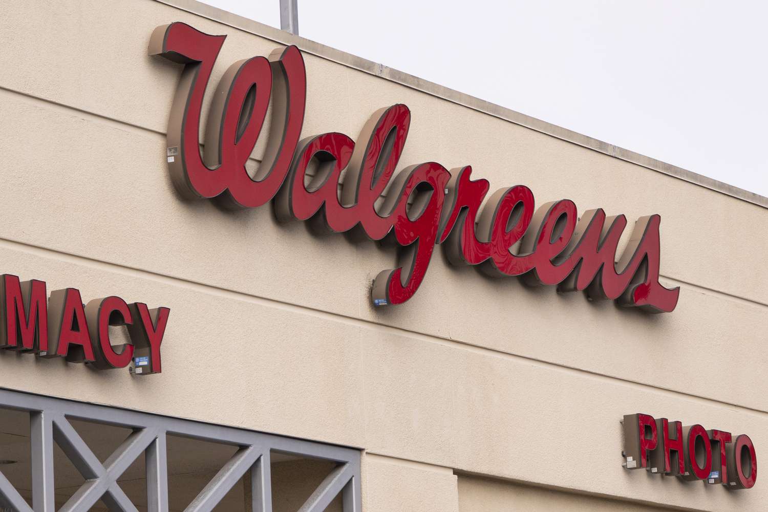 The red Walgreens logo on the side of a building