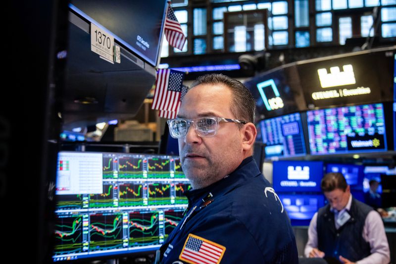 Traders work on the floor of the New York Stock Exchange (NYSE) in New York, US, on Thursday, April 10, 2025.