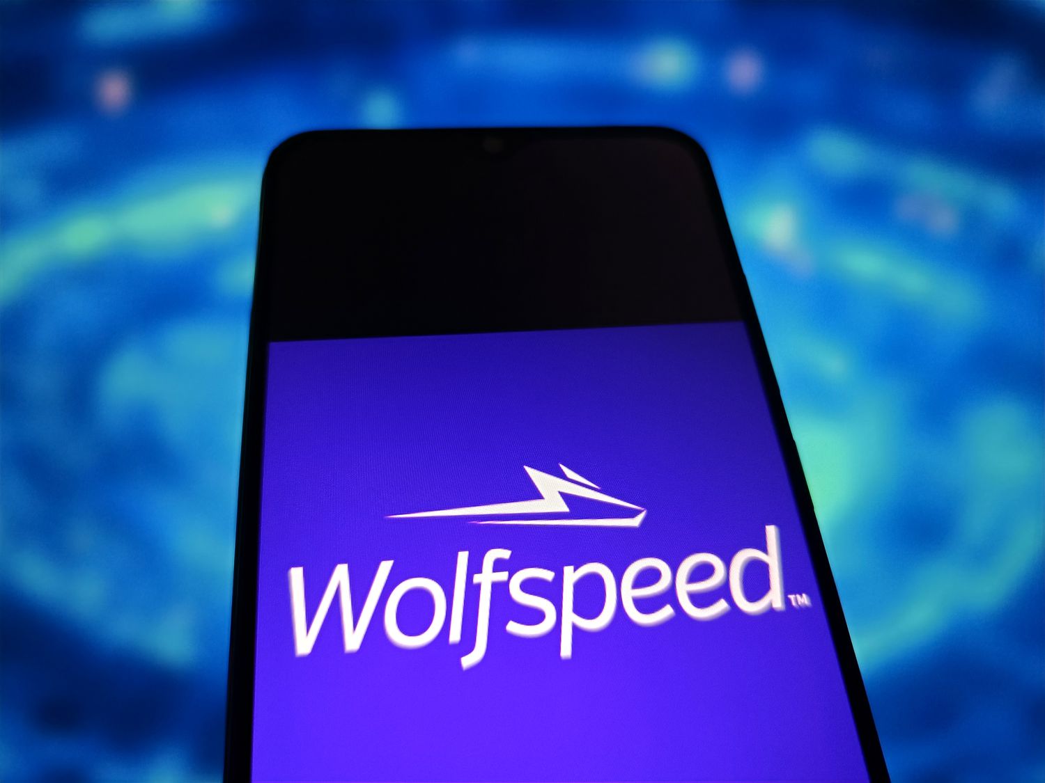 Wolfspeed logo is displayed on a smartphone
