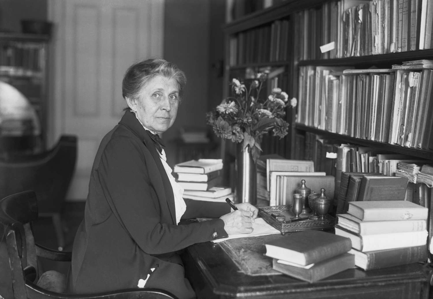 Ida M. Tarbell at her desk. She was the investigative journalist and chronicler of American industry, famous for her classic "The History of the Standard Oil Company." 9/20/1921