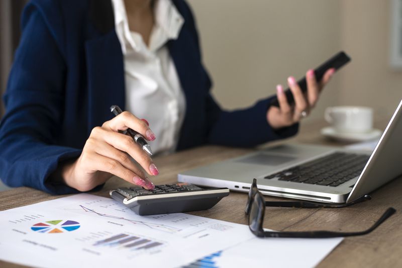 accountant or banker making calculations.