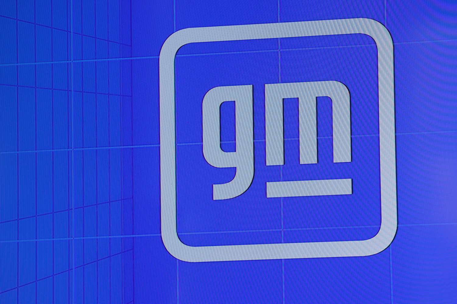 The General Motors logo displayed before a news conference at the Hudson's building in Detroit, Michigan, on April 15, 2024