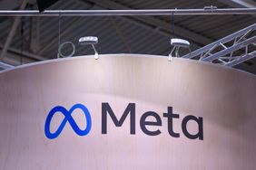 The Meta Platforms logo on display at a conference.