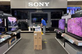 A worker at a California Best Buy store on March 31. 