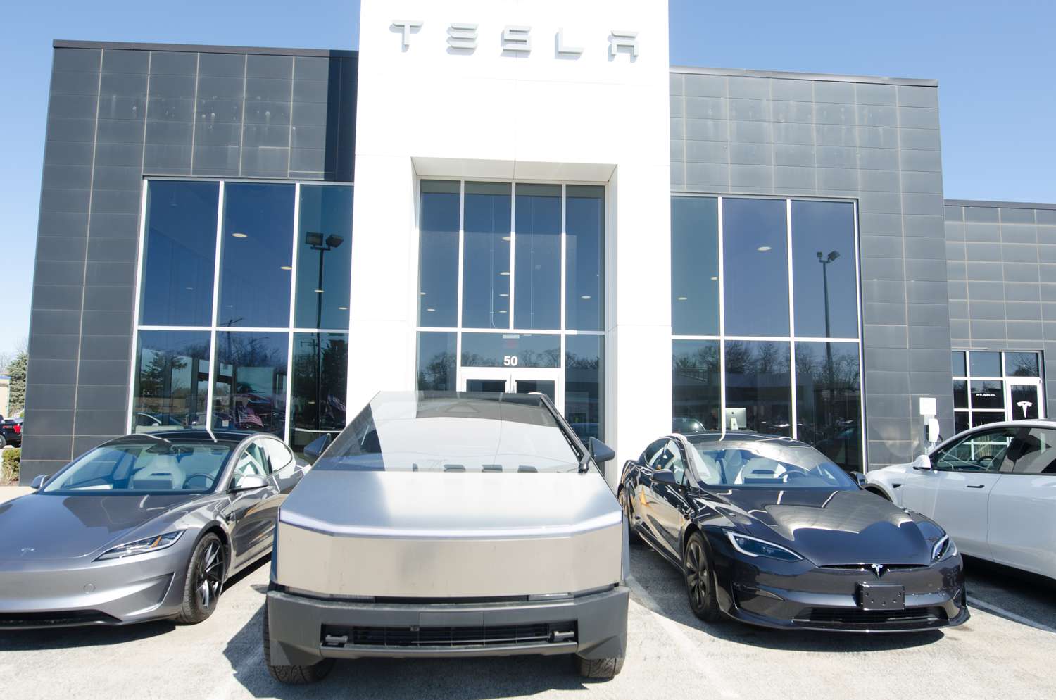 Tesla cars are displayed at a dealership in Westmont, Illinois.
