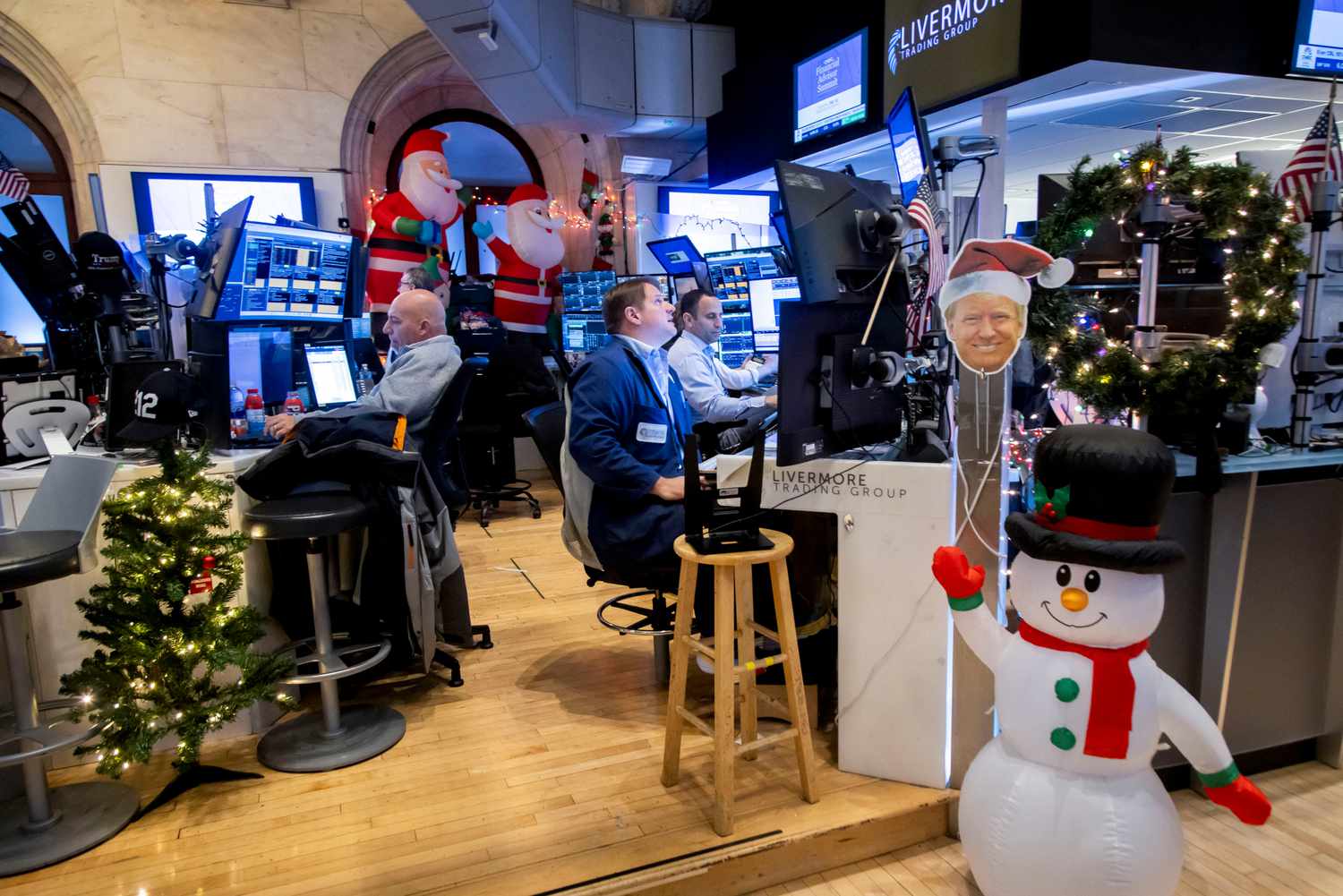 Traders work on the floor of the New York Stock Exchange