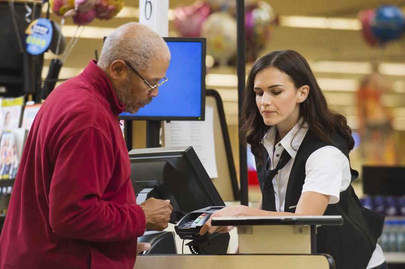 A customer pays for a purchase with a credit card.