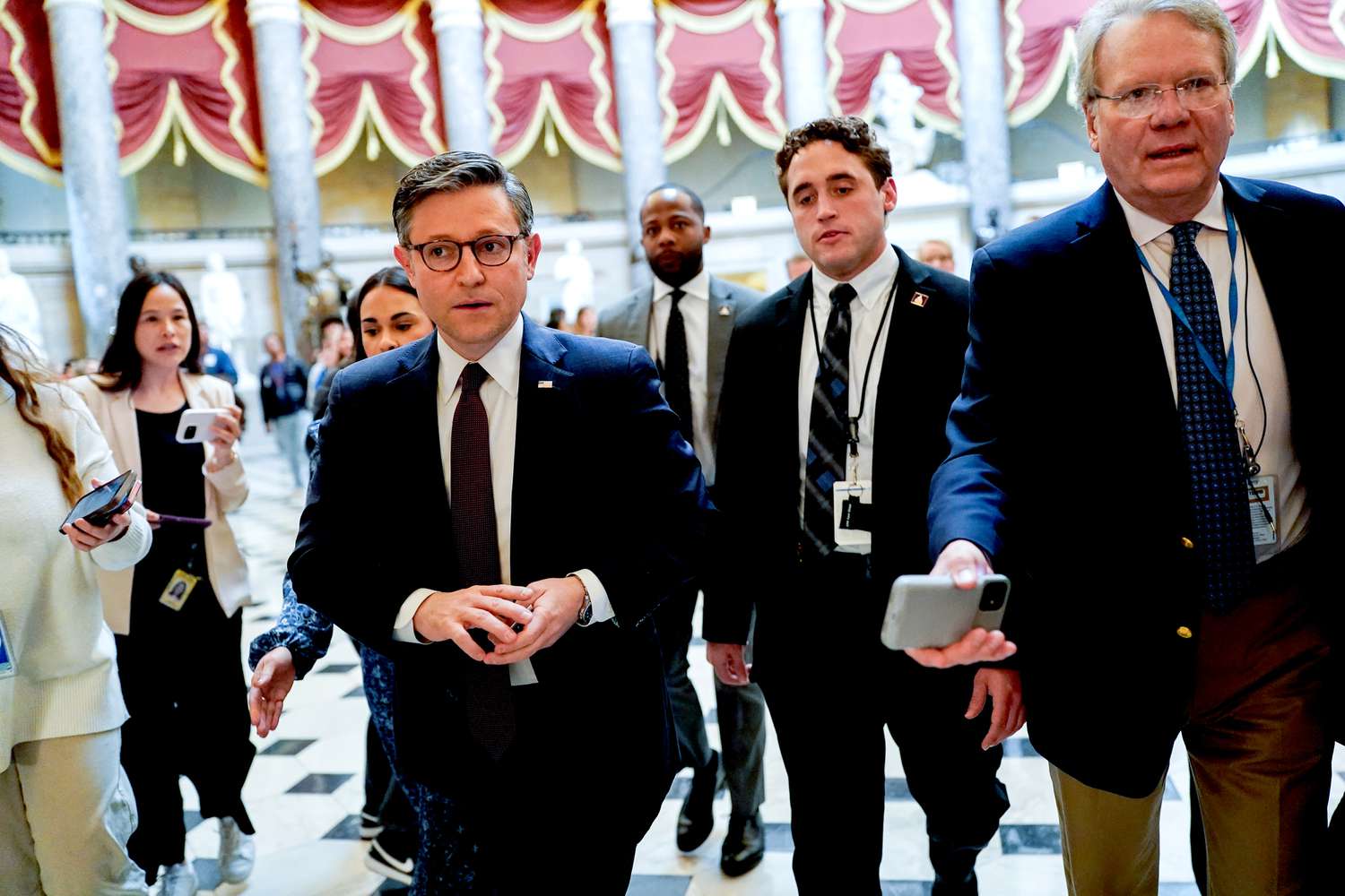 US House Speaker Mike Johnson, a Republican from Louisiana, center left, walks to the House Chamber at the US Capitol in Washington, DC, US, on Tuesday, Feb. 25, 2025.